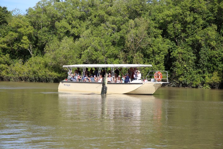 a small boat in a body of water